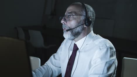 Serious-male-teleworker-in-headset